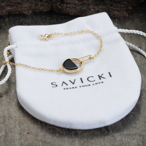 Bransoletka koło Savicki: srebrna pozłacana, onyks